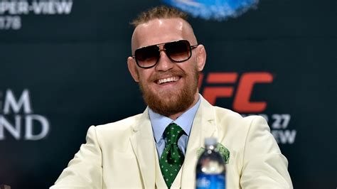 conor mcgregor white suit.